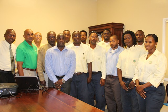 Some linesmen from the Nevis Electricity Company Ltd. at the opening ceremony of the Nevis Electricity Company Ltd. Distribution and Transmission Training Workshop on September 05, 2016 at its conference room at Long Point with (left) Acting Manager Jervan Swanston, (second from left) Technical Trainer from Barbados Light and Power Curtis Brewster, (third from left) Transmission and Distribution Manager Ian Ward, (fourth from left) Chairman of the NEVLEC Board of Directors Farrell Smithen and (fifth from left) Minister responsible for Public Utilities in the Nevis Island Administration Hon. Alexis Jeffers